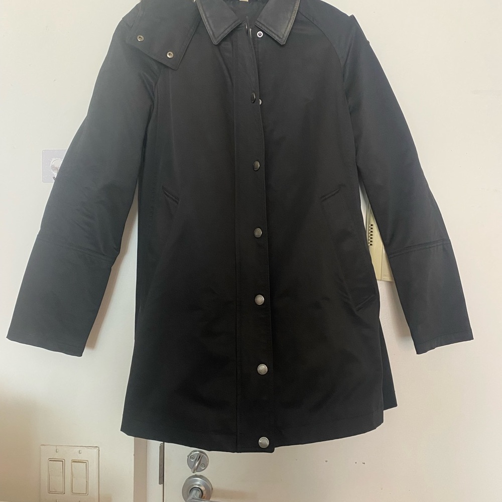 Burberry A line Raincoat with removable vest and hood.